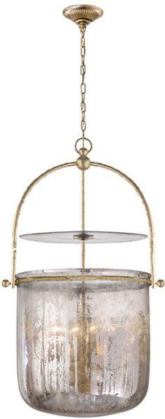 an old fashioned light fixture hanging from the ceiling with a glass bowl on it's side