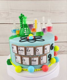 a cake decorated with the elements of an experiment