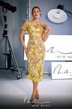 Introducing Grayson Flower Embroidered Midi Dress In Yellow! This stunning dress features delicate flower embroidery that adds a touch of elegance and charm. Perfect for any occasion, the midi length and yellow hue bring both style and comfort. Elevate your wardrobe with this must-have piece. Spring Floral Embroidered Midi Dress For Wedding Guest, Spring Wedding Guest Midi Dress With Floral Embroidery, Yellow Summer Dresses For Wedding Guest, Yellow Midi-length Wedding Dress, Yellow Midi Length Wedding Dress, Yellow Short Sleeve Midi Dress For Evening, Spring Wedding Guest Yellow Dress, Yellow Spring Wedding Guest Dress, Yellow Midi Dress For Spring Wedding