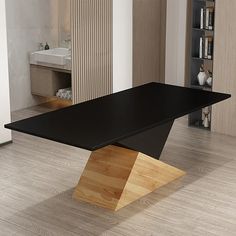 a black table sitting on top of a hard wood floor