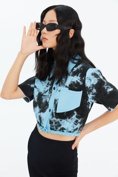 "Tie dye" short sleeve cropped polo shirt Color: SEA AT NIGHT  83% RECYCLED VISCOSE 17% ELASTIC + 100% RECYCLED BRIGHT RAYON This item runs true to size Model is 174cm wearing size S. Worn with Skinny Pants Size S measurement: 17" (43 cm) Machine wash cold   With every piece sold we plant a tree through our reforestati Casual Tie Dye Short Sleeve Crop Top, Casual Tie-dye Short Sleeve Crop Top, Fitted Acid Wash Short Sleeve Tops, Spring Tie Dye Short Sleeve Crop Top, Spring Tie-dye Short Sleeve Crop Top, Tie Dye Short Sleeve Crop Top For Summer, Sea At Night, Cropped Polo Shirt, Cropped Polo