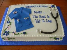 a sheet cake with a stethoscope and shirt on it that says congratulations mark the best is yet to come