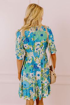 You will be the buzz of the town when you arrive in this pretty blue dress featuring lightweight breezy material patterned with a teal, green, and white floral print, a v-cut neckline with a front tie detail, loose half sleeves, and a relaxed skirt silhouette that falls into a straight mid-thigh length hemline! on products Measurements S : Bust 34", Hip 38", Length 36", Sleeve Length 12.5", Waist 28-30". M : Bust 36", Hip 40", Length 36", Sleeve Length 13", Waist 30-32". L : Bust 38", Hip 42", L Pretty Blue Dress, Floral Babydoll Dress, V Cut, V Cuts, Babydoll Dress, Teal Green, Green And White, Blue Ocean, Blue Dress