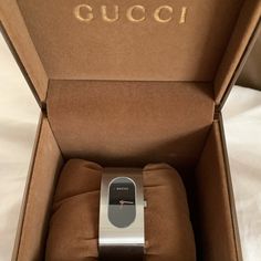 New In Box 2400l Modern Gucci Watch With Polished Finish, Modern Analog Evening Watch, Modern Gucci Jewelry With Round Dial, Gucci Timeless Watch With Polished Finish, Gucci Silver Watch With Polished Finish, Classic Gucci Watch With Polished Finish, Timeless Gucci Watch With Polished Finish, Modern Gucci Watch Accessories With Metal Dial, Gucci Watch Accessories With Round Dial For Formal Occasions