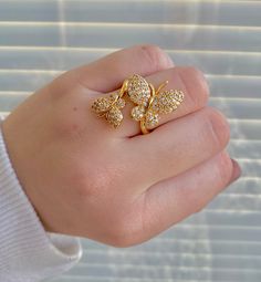 This butterfly ring is a gorgeous cuff or wrap ring. It is made of brass but it is long-lasting gold plated, the ring is open so it allows for the size to be adjustable. Without adjusting the size are about 17.5mm inner diameter and 2.5mm wide the butterfly on the ring is about 10x12x2.5mm and 15x18.5x2.5mm. it comes down to about a size 7 CHECK OUT our Instagram for more pictures & videos of our necklaces plus exclusive coupons- @kaitmariedesignsco ✨💛 Leave us a review & tag us in pict Butterfly Gold Ring Designs, Adjustable Yellow Gold Butterfly Ring, Adjustable Gold Butterfly Ring, Adjustable Gold Butterfly Ring For Anniversary, Gold Butterfly Ring For Wedding, Adjustable Gold Butterfly Open Ring, Tiffany Nelson, Leave Us A Review, Cool Ear Piercings