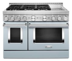 a double oven stove with two burners and one door on the front, in stainless steel