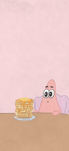 a cartoon character sitting at a table next to a stack of pancakes