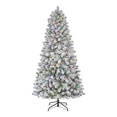 a white christmas tree with multicolored lights and snow flakes on it's branches