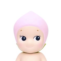 a small doll with a pink hat on it's head