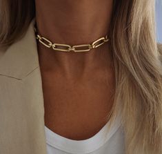 PRODUCT DESCRIPTION Modern chunky link chain choker, simple and shiny. This statement choker necklace has a sophisticated minimal look! If you want to make your outfit look amazing and with a presence, don't miss the necklace on your neck! MEASUREMENT and SIZE (on the model) ✦The total length of the necklace is 14 inches (36cm). Choose your necklace length from the drop-down menu. IMPORTANT NOTE In order to be on the safe side, I would suggest measuring your neck by wrapping string around your n Trendy Gold Chain Link Choker, Trendy Chunky Chain Choker, Trendy Chunky Link Chain Choker, Minimalist Chunky Chain Choker, Trendy Chunky Chain Link Choker, Minimalist Chain Link Choker, Trendy Everyday Chain Choker, Everyday Gold Chain Choker, Trendy Clavicle Chain Choker