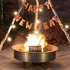 a happy new year fire pit with lights