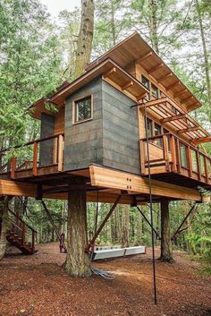 a tree house built in the woods