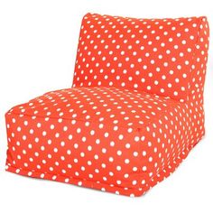 an orange and white polka dot print chair