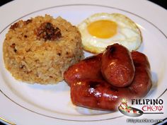 sausages, rice and an egg on a plate