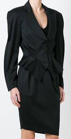 Iconic Thierry Mugler Black Wool Suit   | From a collection of rare vintage suits, outfits and ensembles at https://www.1stdibs.com/fashion/clothing/suits-outfits-ensembles/ Tailored Black Skirt Suit For Business, Black Fall Business Skirt Suit, Black Skirt Suit With Suit Collar For Formal Occasions, Black Skirt Suit For Business In Fall, Black Fall Skirt Suit For Business, Classic Black Skirt Suit For Business, Elegant Black Single Breasted Skirt Suit, Black Skirt Suit With Buttons For Work, Black Single Breasted Skirt Suit For Work