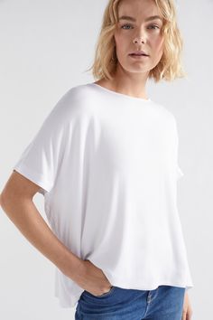 Product Details Loose-sleeved top in responsible viscose jersey.The Telse T-shirt is a narrowed version of our Wide Stretch Top, with a mid-length sleeve and crew neck. The top also has a high-low hem and is crafted from responsible viscose jersey. The top is soft with stretch in the fabric, and drapes gently over the body. Narrowed version of our Wide Stretch Top Mid-length sleeve Crew neck High-low hem Responsible viscose jersey Soft to touch with stretch in the fabric, drapes gently over the Australian Dresses, Clothes Tops, Stretch Top, Plus Size Womens Clothing, Viscose Fabric, High Low Hem, Linen Pants, The Body, Online Womens Clothing