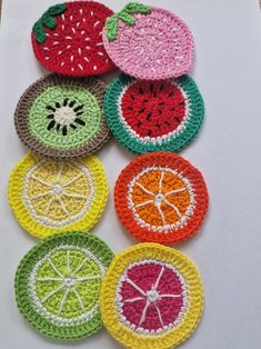 crocheted fruit coasters arranged on top of each other