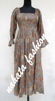 ITEM DESCRIPTION boho and hippie style maxi dress - square neckline with smocked maxi dress - long sleeve summer maxi dress Features: Long sleeve, square neck, Long dress Material: Cotton cambric Fabric: 100% cotton soft light weight ethnic print fabrics  Sleeve Length = 22 inch For more sizes & their measurement, please refer our below chart to understand the sizes variations available with us For your size requirement, please mention your size in seller note at the time of buying. SIZE MEASUREMENT  BUSTLENGTHSHOULDER XXS34 inch51 inch13.5 inch XS36 inch51 inch14 inch S38 inch51 inch14.5 inch M40 inch51 inch15 inch L42 inch51 inch16 inch XL44 inch51 inch16.5 inch 2XL46 inch51 inch17 inch 3XL48 inch51 inch18 inch   Company Return Policy:  Please write for more information to my email direc Long Sleeve Flowy Smocked Maxi Dress, Flowy Long Sleeve Smocked Maxi Dress, Bohemian Flowy Maxi Dress With Smocked Cuffs, Bohemian Maxi Dress With Square Neck For Vacation, Flowy Bohemian Maxi Dress With Smocked Cuffs, Bohemian Square Neck Maxi Dress For Vacation, Bohemian Square Neck Maxi Dress For Beach, Bohemian Full-length Maxi Dress, Bohemian Full Length Maxi Dress