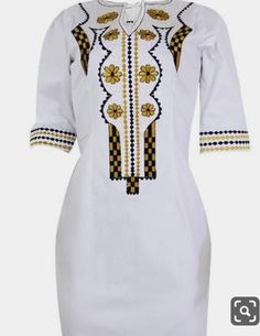 This  outfit is a female African dress. it comes with some touches of carefully and beautifully designed embroidery.  It is a hand crafted Afro-chic dashiki. It comes in various sizes which you select from the size chart when placing your order. I accept custom measurements to process your orders for you if you want. So it is a custom made piece for you to show off in.  If you have any questions whatsoever, please feel free to contact me and i will gladly help. I am at your service. Wakanda Dress, Wakanda Fashion, Dashiki Prom Dress, Embroidery Dresses, African Lace Styles, Dashiki Dress, African Dresses Men, Women Embroidery, African Styles