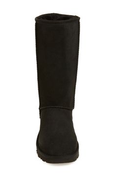 Pretreated to protect against moisture and staining, this mid-calf boot in a classic silhouette is a cozy cold-weather favorite lined in plush genuine shearling. A Treadlite by UGG sole provides increased cushioning, durability and traction on both wet and dry surfaces. Style Name:UGG Classic Ii Genuine Shearling Lined Tall Boot (Women). Style Number: 5179829. Available in stores. Classic Boots With Sheepskin And Suede Lining, Classic Sheepskin Boots With Suede Lining, Classic Shearling Boots With Round Toe, Classic Sheepskin Boots For Fall, Classic Fall Shearling Boots, Boot Cuff, Tall Boot, Ugg Classic, Urban Outfits