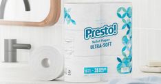 two rolls of presto toilet paper sitting next to each other on a bathroom counter