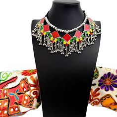 Summer is here! Celebrate with a colorful, playful, fun choker that compliments your wardrobe. Excellent quality, detailed ghungroo dangles, saturated vivid colors. Comfortable silky black cord tie, adjustable to the perfect fit for you. Shop chokers here: https://www.etsy.com/shop/boutiquebymaryam?section_id=23900841 Be sure to visit the rest of my shop here: https://www.etsy.com/shop/boutiquebymaryam Colorful Beads Jewelry For Festival Gift, Colorful Beaded Jewelry For Festival Gift, Festival Jewelry With Colorful Beads As Gift, Festival Jewelry With Colorful Beads For Gift, Multicolor Motif Jewelry For Rituals, Handmade Festival Necklaces, Multicolor Ritual Jewelry With Motifs, Traditional Necklaces For Festivals, Traditional Necklaces For Festival Gifts