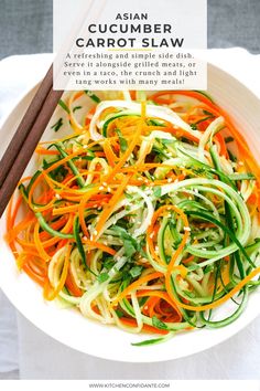 Asian Cucumber Carrot Slaw in a white bowl. Asian Salad Recipe, Carrot Salad Recipes, Carrot Slaw, Fresh Salad Recipes, Grilled Meats, Spiralizer Recipes, Slaw Recipes, Best Salad Recipes, Cucumber Recipes