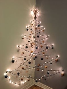 a christmas tree made out of ornaments and lights