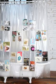 a white shower curtain with pictures on it