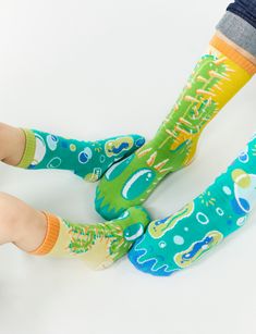 Go matchy mismatchy with your favorite human! In this bundle, you'll get 2 pairs of Pokey & Poppy Pals Socks: 1 adult-size pair for you + 1 any-size pair for your pal! These uber wacky socks are 1 of 4 crazy styles from our limited edition Opposocks Collection designed by artist Nate Bear (aka @bearbrains). Kids Sizes have non-slip grips on the bottom to prevent slips.| • Crew-length tube socks for adults and kids • Non-Slip Grips for safety on Kids socks • Unisex fit • Designs are woven in (nev Playful Green Socks For Stocking Stuffers, Cute Green Socks For Stocking Stuffers, Playful Green Socks For Gifts, Fun Non-slip Socks For Playtime, Multicolor Cotton Socks For Playtime, Fun Round Toe Socks For Playtime, Green Casual Socks For Playtime, Casual Green Socks For Playtime, Fun Green Cotton Socks