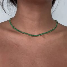 Beautiful Diamond Tennis Necklace. A staple in your jewelry collection. Handmade in New York City of polished 14k white gold. This tennis necklace showcases a delicate 4 prongs in line chain embellished with dozens of shimmering ( NO Lab Made) Emeralds . Quality to us is important and that is why we hand select our diamonds for premium quality. - 19.00 ct. t. w. Emeralds - 19.61 gr 14k Gold Weight Green Oval Necklace For Party, Oval Emerald Necklace With Jewels In Fine Jewelry Style, Fine Jewelry Oval Emerald Necklace With Jewels, Luxury Oval Emerald Necklace With Jewels, Oval Emerald Necklace With Jewels, Fine Jewelry Emerald Necklace For Parties, Green Oval Jewelry For Party, Emerald Tennis Necklace, Dazzling Gold Emerald Necklace