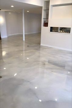 an empty room with white walls and flooring is seen in this image from the inside