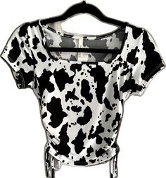 Trendy Cow Print Tops For Spring, Trendy Cow Print Top For Summer, White Cow Print Top For Summer, Spring Cow Print Cotton Top, Spring Cow Print Short Sleeve Top, Spring Cotton Cow Print Top, Spring Casual Cow Print Tops, Casual Cow Print Tops For Spring, Casual Spring Tops With Cow Print