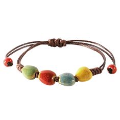 PRICES MAY VARY. VIBRANT HANDCRAFTED CERAMIC BEADS: Each bead on this bohemian bracelet is crafted from ceramic and uniquely colored, offering a vibrant spectrum from earthy greens to sunny yellows, making it a standout accessory. ADJUSTABLE LEATHER CORD: The robust leather cord is designed for longevity and comfort, featuring an adjustable knot that allows for a customized fit for any wrist size. PERFECT FOR LAYERING OR SOLO WEAR: Whether worn alone for a subtle hint of color or layered with ot Bohemian Brown Bracelets For Vacation, Bohemian Multicolor Friendship Bracelets For Vacation, Bohemian Brown Beaded Bracelets For Vacation, Bohemian Multicolor Bracelets With Adjustable Cord, Bohemian Brown Beaded Bracelets With Sliding Knot, Bohemian Multicolor Beaded Bracelets With Adjustable Length, Bohemian Brown Beaded Bracelet With Sliding Knot, Bohemian Multicolor Adjustable Friendship Bracelets, Bohemian Brown Friendship Bracelets With Colorful Beads