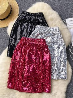 Sparkling Sequin Mini Skirt for Party Wear Holiday Party Glitter Skirt, Holiday Party Skirt With Glitter, Winter Sequin Skirt For Night Out, Evening Glitter Skirt For Party Season, Glamorous Black Holiday Skirt, Glamorous Black Skirt For The Holidays, Glamorous Winter Skirt, Glamorous Black Mini Skirt With Contrast Sequin, Holiday Party Sequined Bottoms