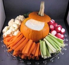 a platter filled with carrots, celery and cauliflower