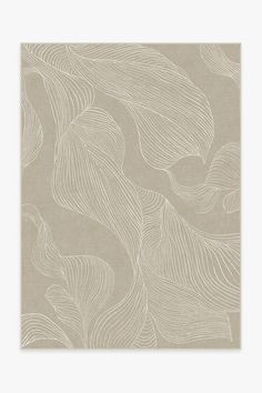 a beige and white wallpaper with wavy lines in the middle, on top of it