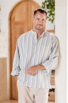 Designed with steel blue stripes, Jamriang's pullover shirt is a subtle way to stand out. Handcrafted from 100% cotton, the collarless shirt features a subdued stripe pattern, four buttons at the collar, and a single chest pocket. Light Blue Long Sleeve, Collarless Shirt, Light Blue Shorts, Cotton Shirts For Men, Mens Stripes, Stripe Shirt, Beach Shirt, Mens Button Up, Men Fashion Casual Outfits