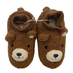 Keep Your Kids Cozy As They Relax At Home Or Play With Their Favorite Toys With These Bear Bootie Slippers From Cat & Jack. The Closed-Toe Booties Feature A Soft Upper And Insole With Ribbed Cuffs To Provide Their Feet All-Day Comfort, While The Slip-On Design Allows For Easy On And Off. These Medium-Width Slippers Are Sure To Get Your Little One Smiling. Machine Washable. Footwear Upper Material: 100% Polyester. Footwear Outsole Material: 98.3% Polyester And 1.7% Rubber. Kids Size Xl (11/12) Cute Brown Round Toe Slippers, Playful Winter Slippers For Playtime, Playful Winter Slippers, Cute Winter Slippers For Playtime, Cute Brown Non-slip Booties, Cute Round Toe Slippers For Playtime, Slippers Brown, Bootie Slippers, Cat & Jack