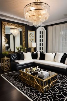 a living room with black and white furniture, chandelier and large mirror on the wall