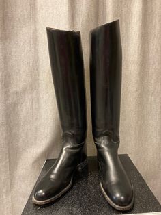 "These superb quality riding boots are made by Dehner's of Omaha. Dehner was established in Kansas in 1875, originally making custom made boots for the cavalry. Today in Omaha they make the highest quality Polo and riding boots as well as biker and law enforcement boots. They also make custom shoes and boots. These boots were custom made as there is a name, Mrs D Knight, printed on the inside. There is no shoe size marked but I think they are size 8. The outer sole is 29cm from heel to tip of to Classic Knee-high Moto Boots For Formal Wear, Classic Knee-high Moto Boots For Formal Occasions, Classic Riding Knee-high Boots, Classic Knee-high Riding Boots, Classic Round Toe Knee-high Riding Boots, Classic Riding Boots With Leather Sole, Classic Winter Riding Boots, Classic Riding Boots With Leather Lining, Classic Knee-high Boots With Leather Sole For Riding