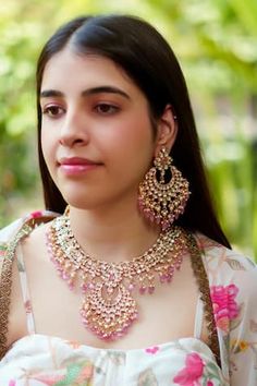 Gold finish clear kundan studded necklace in floral crecent pattern with pink bead and pearl tassels. Comes with pair of earrings and maangtikka. - Aza Fashions Bridal Chandbali Necklace With Mirror Work, Bollywood Style Kundan Necklace For Designer Wear, Eid Chandbali Necklace With Mirror Work, Eid Kundan Necklace With Chandbali Shape, Festive Pink Chandbali Necklace, Traditional Pink Necklaces For Reception, Traditional Pink Necklace For Reception, Chandbali Necklaces For Eid, Pink Elegant Kundan Necklace For Diwali