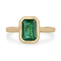 Luxury Octagon Emerald Ring With Bezel Setting, Timeless Bezel-set Emerald Cut Emerald Ring, Timeless Bezel-set Emerald Ring For May Birthstone, Timeless Emerald Ring With Bezel Setting For May Birthstone, Formal Bezel-set Baguette-cut Emerald Ring, Timeless Bezel Set Emerald Ring For May Birthstone, Timeless May Birthstone Emerald Ring With Bezel Setting, Formal Baguette Cut Emerald Ring With Bezel Setting, Classic Emerald Ring With Asscher Cut And Bezel Setting