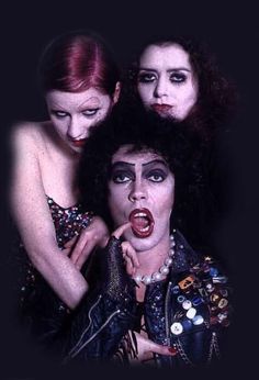 three women with makeup and hair are posing for the camera