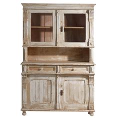 an old wooden hutch with glass doors