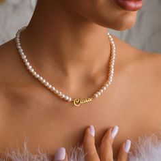 Freshwater Pearl Name Necklace | Personalized Wedding Jewelry | Christmas Gifts for Her | Gold Name Necklace | Pearl Chain | Bridal Party Gifts This handcrafted necklace features a delicate chain adorned with lustrous freshwater pearls and a customized name pendant, making it a meaningful and timeless piece. Whether you are looking for a unique personalized wedding gift, a thoughtful Christmas present for her or a treasured keepsake for your bridal party, this necklace is designed to make your loved one feel extra special. *Material: 925 Sterling Silver, Freshwater Pearl *Finishes: Silver, Gold, Rose Gold *Lengths: 12", 14", 16", 18", 20"   (with 2" adjustable chain) *Minimalist & Stylish: This necklace will look great with any outfit, adding a personal yet chic touch. Perfect for: *Weddin Elegant Personalized Pearl Necklace As A Gift, Personalized Pearl White Necklace For Gift, Stainless Steel Pearl Chain Necklace For Gift, Multi-strand Pearl Chain Necklace As Gift, Multi-strand Pearl Necklace Chain As Gift, Pearl Name, Thoughtful Christmas Presents, Christmas Presents For Her, Pendant Making