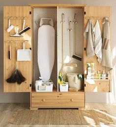 a wooden cabinet filled with lots of bathroom items