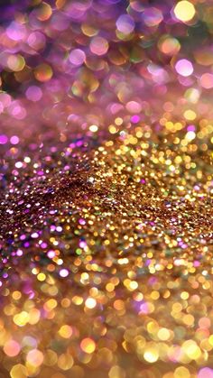 a close up view of some gold glitter