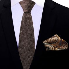 Brown Textured Tie Step into the realm of refined elegance with our luxurious solid brown silk necktie. Meticulously crafted from the finest silk, this necktie is an embodiment of timeless sophistication and impeccable style. The rich, deep brown hue exudes an air of warmth and understated charm, making it a versatile accessory for a range of occasions. Available in two width options, 3.25" inches and 2.5" inches, as well as regular and extra-long lengths of 60" inches and 63" inches respectivel Classic Brown Neckwear For Formal Occasions, Luxury Gold Tie For Black Tie Events, Gold Tie For Black Tie Events, Classic Ties With Pocket Square As Gift, Classic Ties With Pocket Square For Gift, Classic Brown Suit And Tie Accessories As Gift, Dapper Brown Suit And Tie Accessories For Wedding, Dapper Ties With Pocket Square For Black Tie Events, Elegant Pocket Square For Formal Occasions