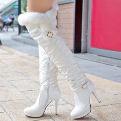 Elevate your style with these White Stiletto Heels Fur Shoes. Featuring a buckle detail and over-the-knee length, these platform boots are a statement-making choice for any fashion-forward individual. Color: White Heel Type: Stiletto heel Heel height: 5.51" / 140 mm approx Product measurements were taken using size 8. Please note that measurements may vary by size. Toe: Round toe With platform Buckle around embellishment Zipper design makes it easier to put on and take off Handcrafted US sizing. Luxury White Knee-high Heeled Boots, Luxury Knee-high Platform Heeled Boots, Luxury Knee-high Party Boots, Luxury Knee-high Heels For Winter, Luxury Red Knee-high Boots For Women, Luxury Party Knee-high Boots For Women, Luxury Platform Boots For Party, Elegant Luxury High Heel Platform Boots, Elegant Luxury White Knee-high Boots